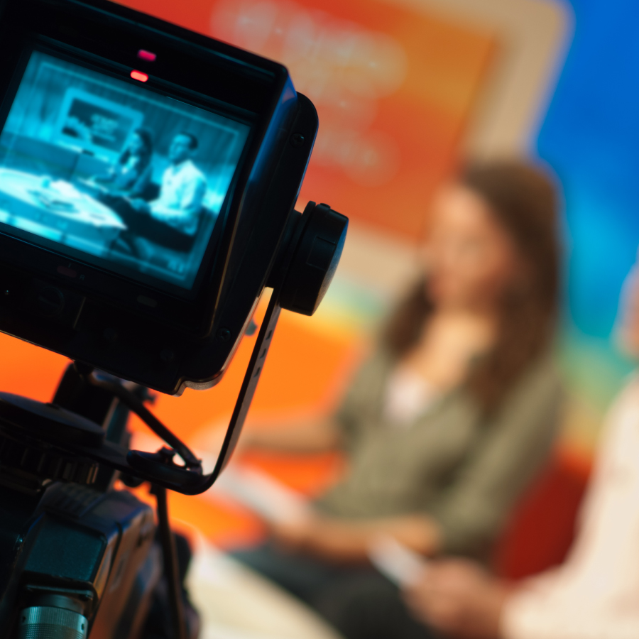 A video camera broadcasting a live show for viewers.