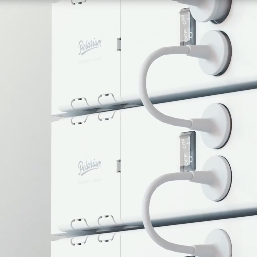 A white wall filled with various white electrical cords, showcasing a neat and streamlined aesthetic.